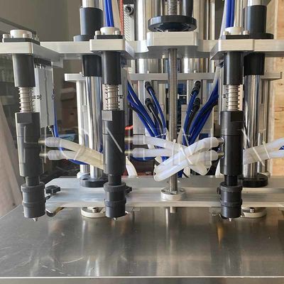 Ausrüstung für die Herstellung von Flüssigparfumen Vierköpfige automatische Parfümfüllmaschine
