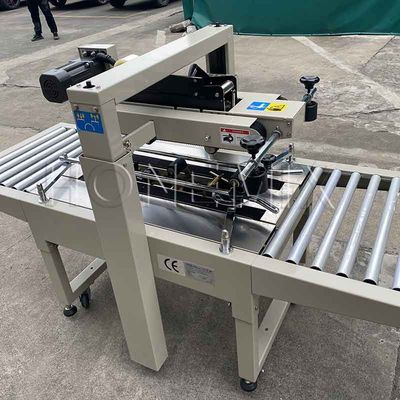 220V / 50HZ Automatische Verpackungsmaschine 12mm Kartonbox Versiegelung Klebeband